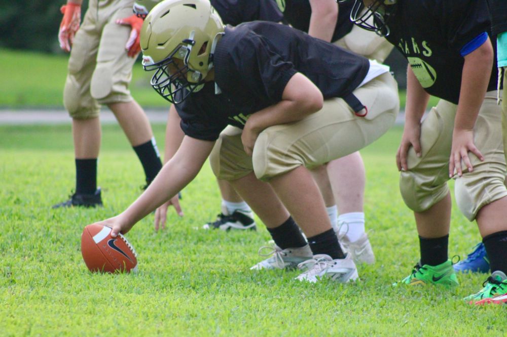 Coach setting the ball at practice